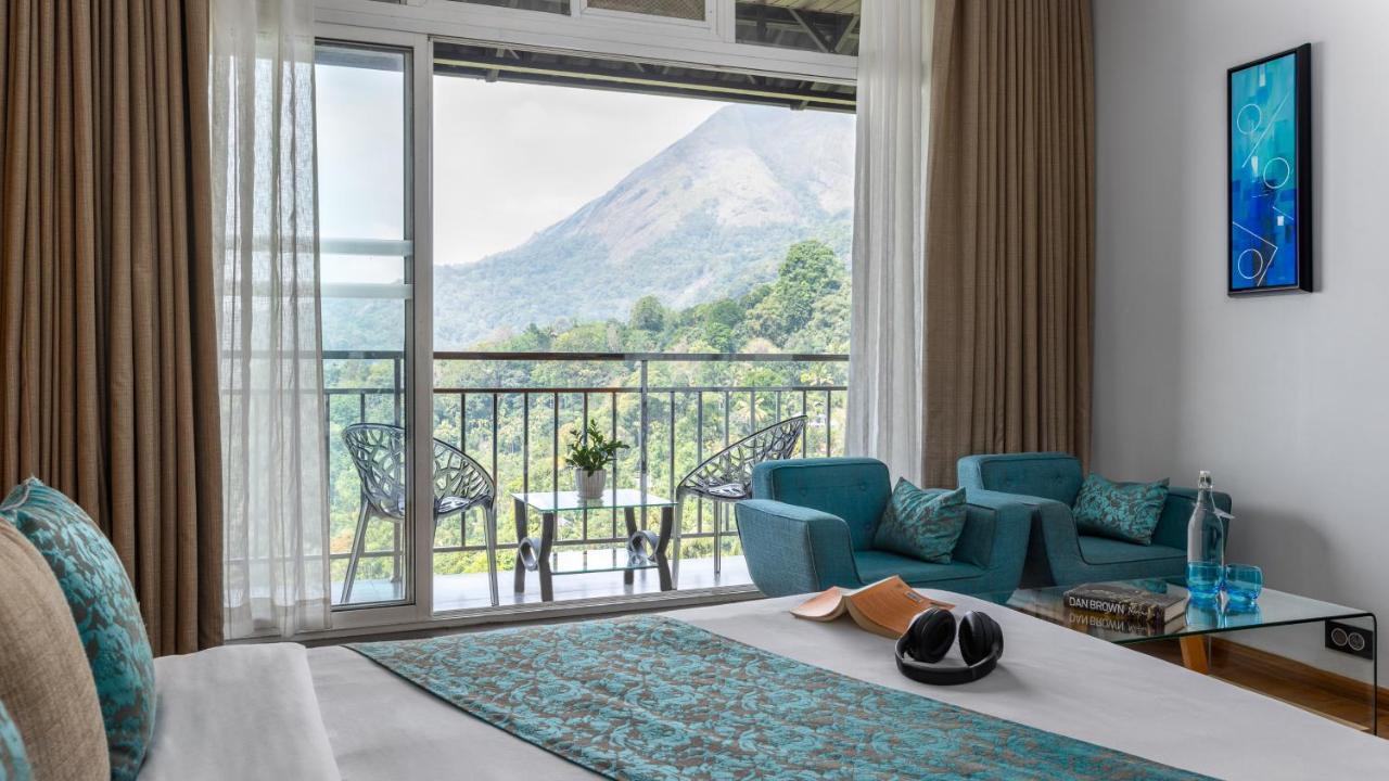 The Panoramic Getaway Hotel Munnar Exterior photo View of Mount Apo from the hotel