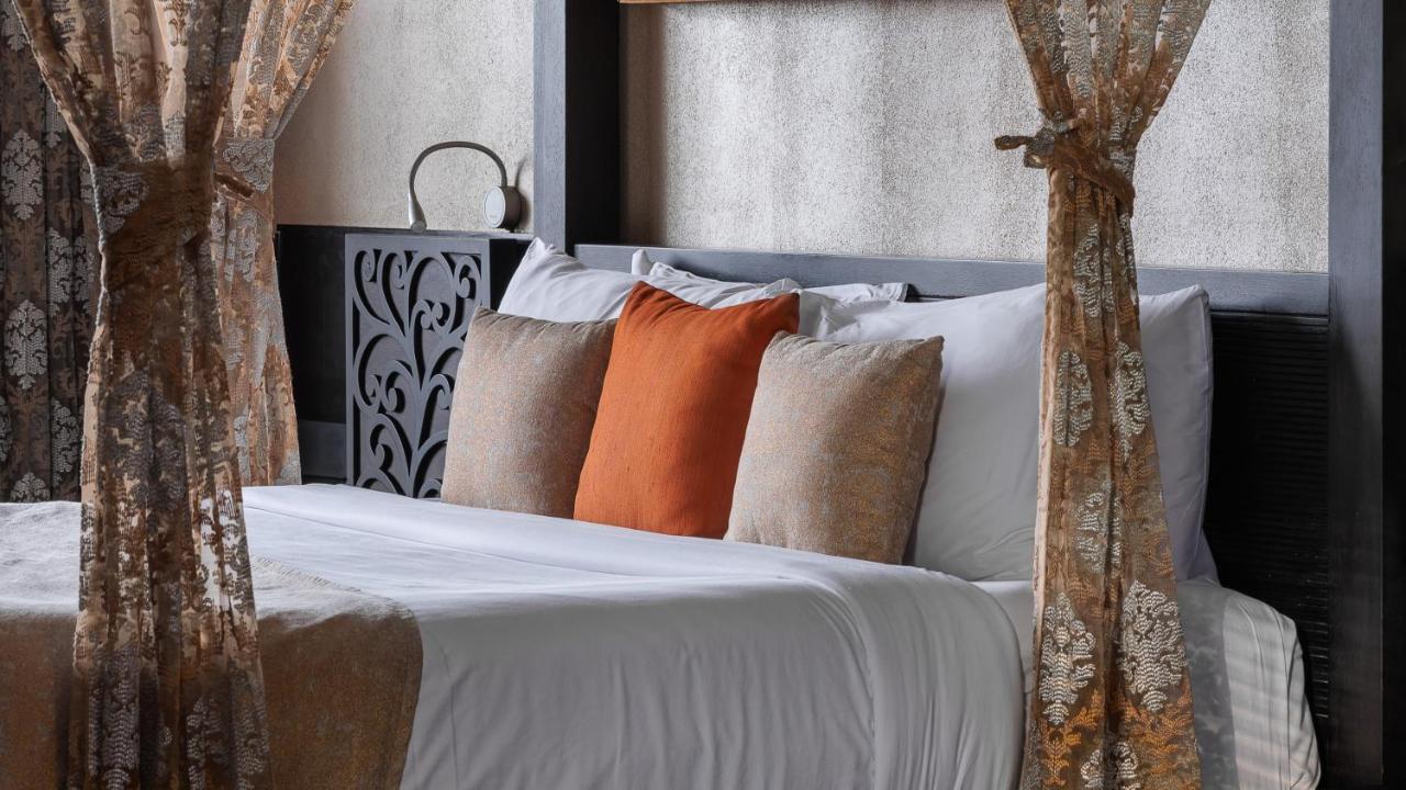 The Panoramic Getaway Hotel Munnar Exterior photo A bed with cushions