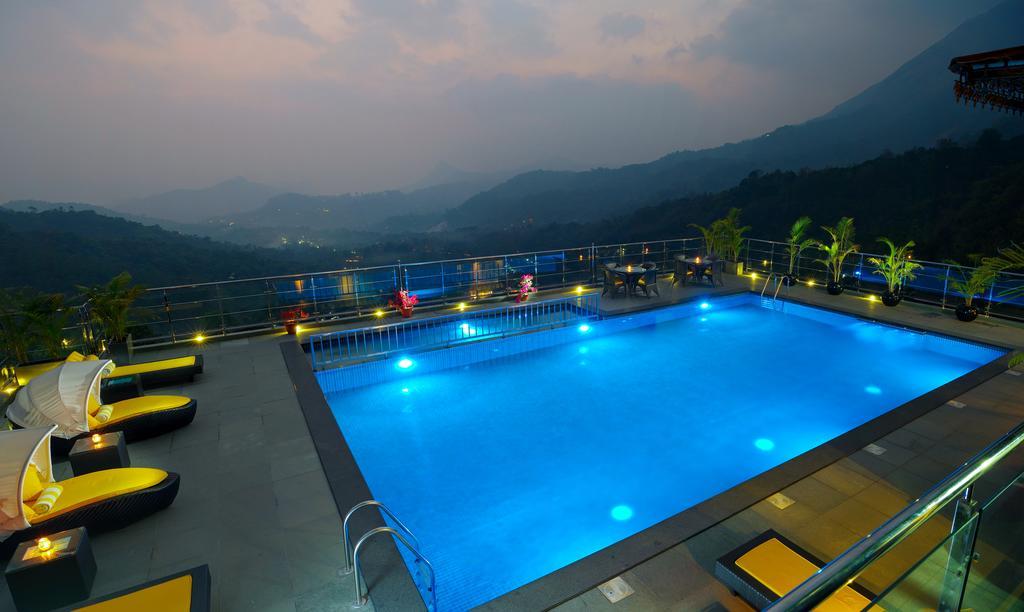 The Panoramic Getaway Hotel Munnar Exterior photo The swimming pool at the resort