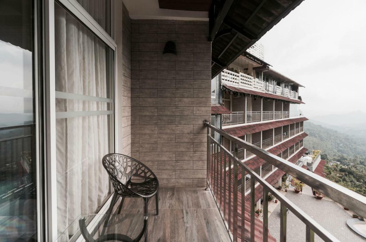 The Panoramic Getaway Hotel Munnar Exterior photo A balcony