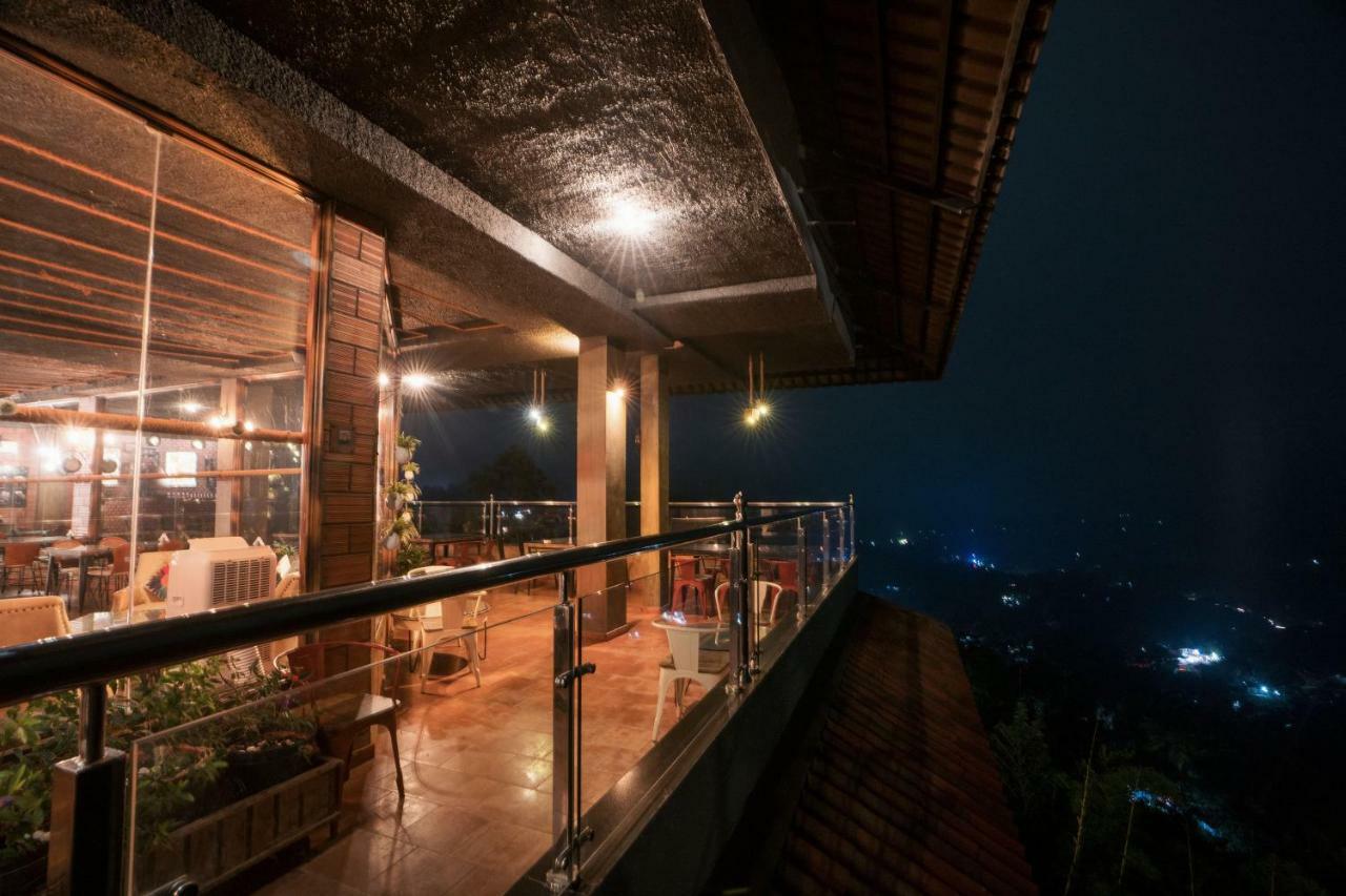The Panoramic Getaway Hotel Munnar Exterior photo The restaurant at the top of the tower